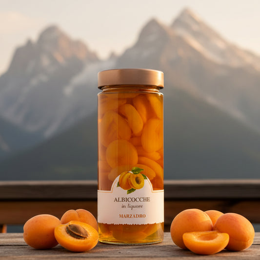 Albicocche in liquore • 650g • Tutta la morbidezza del frutto custodita in un abbraccio alcolico